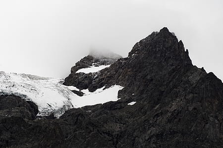 aerial photography of mountain covered with snow thumbnail