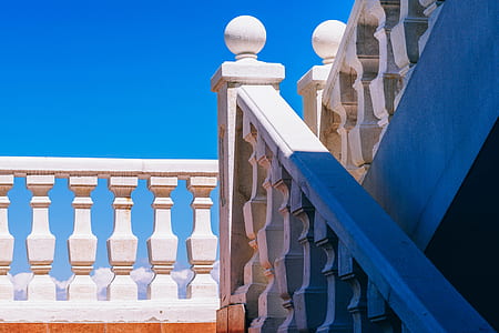 white baluster under blue sky thumbnail