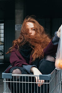 woman riding on shopping cart thumbnail
