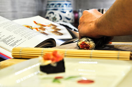 person making sushi thumbnail