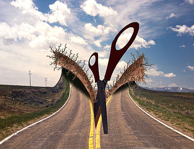 big scissors cutting road thumbnail