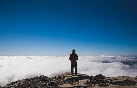 man near cloudy sky during daytime thumbnail