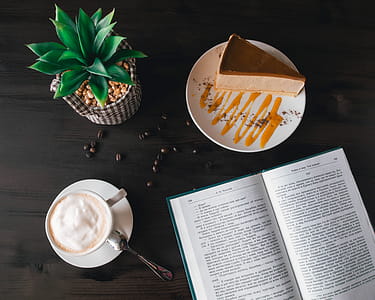 Opened Book Near Custard Cake and Coffee thumbnail