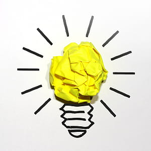 Idea Concept with Yellow Crumpled Paper thumbnail