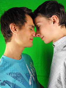 two men wearing white and blue shirts thumbnail