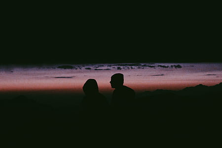 silhouette photo of two persons thumbnail