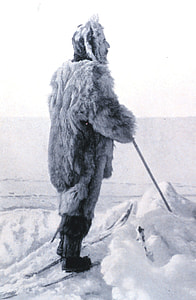 man holding stick on snow thumbnail