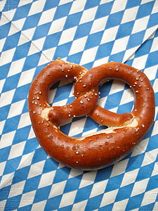 pretzel on blue and white textile thumbnail