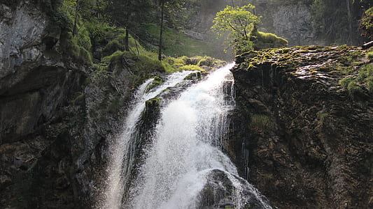 landscape photography of waterfalls during daytime thumbnail