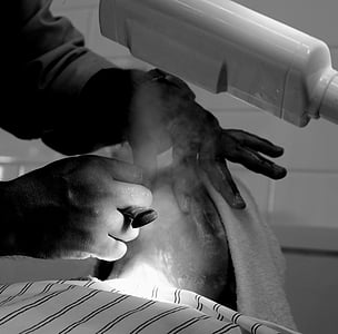 person lying on bed grayscale photography thumbnail