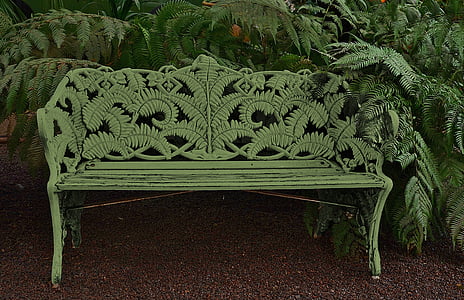 white wooden bench beside green leafed plant thumbnail