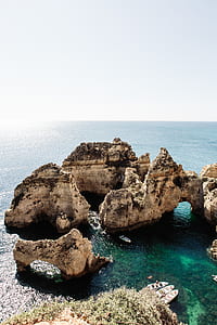 photo of island with rock formations thumbnail