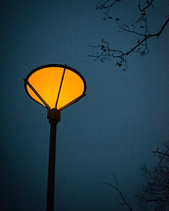 yellow outdoor lamp under blue sky thumbnail