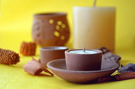 Candle in a terra-cotta holder thumbnail