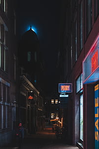 woman walking on alley thumbnail