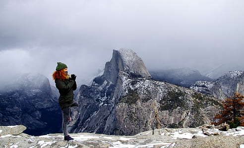 woman on top of cliff thumbnail