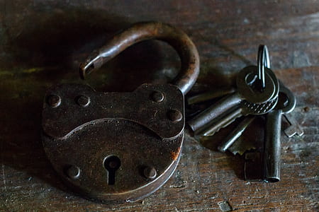 brass padlock and keys thumbnail