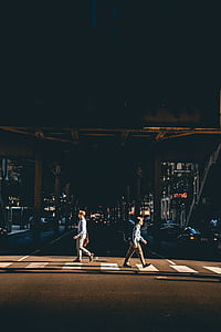 two men walking on street thumbnail