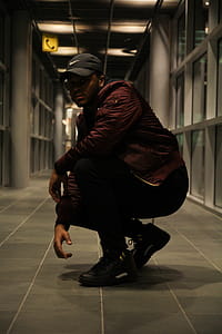 Man Wearing Brown Jacket thumbnail