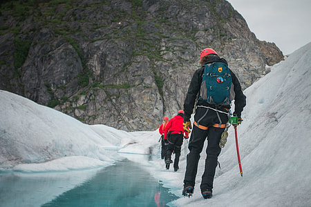man walking on ice mountain thumbnail