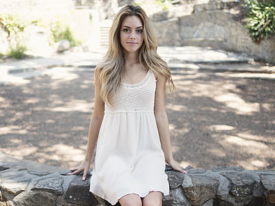woman wearing white tank dress during daytime thumbnail
