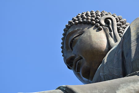 low angle photo of Buddha at daytime thumbnail