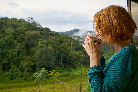 woman drinking on ceramic mug thumbnail