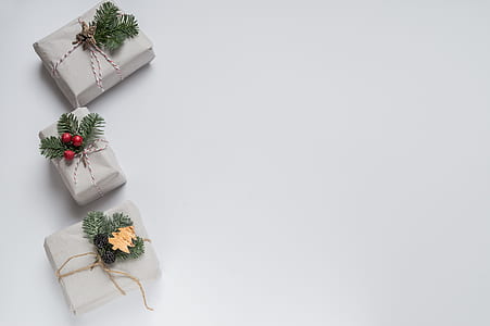 three white boxes with green artificial leaf accent thumbnail
