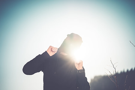 Man Hiding Himself Under His Beanie Cap thumbnail