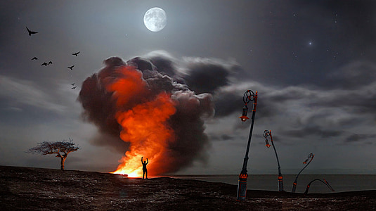 silhouette of person standing near flame under full moon digital wallpaper thumbnail