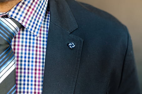 Closeup Photo of Man in Black Suit Jacket thumbnail