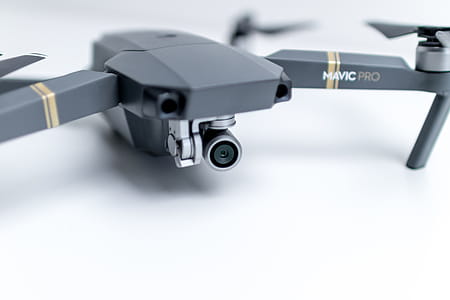 Modern drone on white desk in the office ready to filming thumbnail