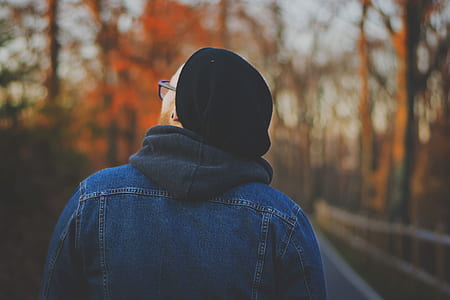 selective focus photography of man looking at top thumbnail