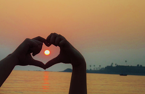 silhouette of hand heart symbol thumbnail