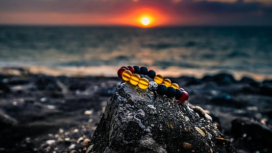 Beaded Black and Brown Bracelet on Rock thumbnail