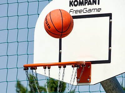 orange basketball and basketball ring thumbnail