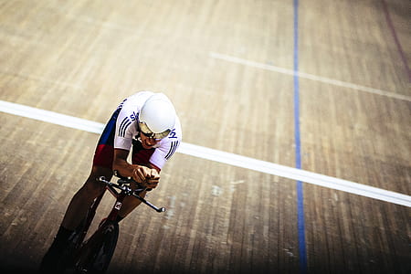man in white shirt riding bicycle thumbnail