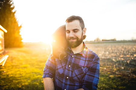 man in blue plaid shrit thumbnail