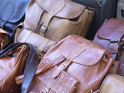 women's brown leather backpacks closeup photography thumbnail