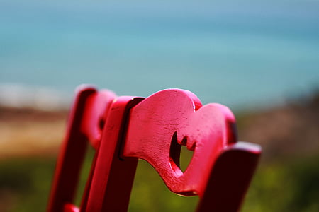 selective focus photography of two red wooden chair thumbnail