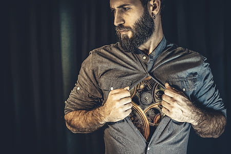 man with mechanical chest tattoo thumbnail