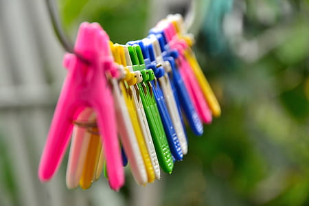 selective focus of clothes pegs thumbnail