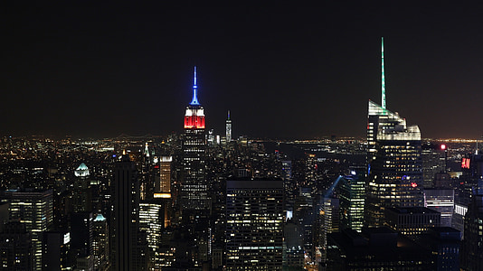 aerial photography of high-rise buildings at nighttime thumbnail