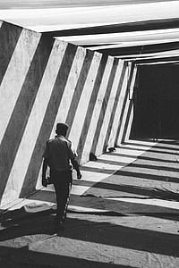 man walking towards gate thumbnail