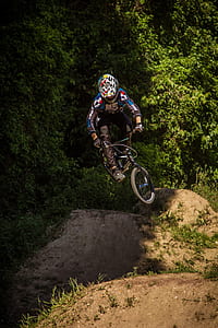 person cycling on mountain thumbnail