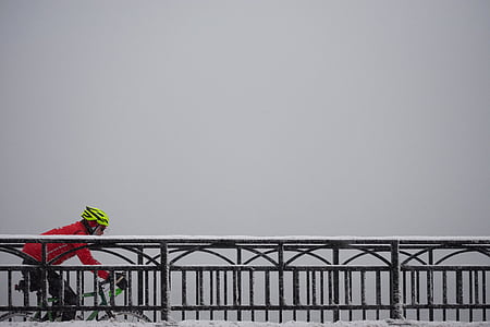 person riding bicycle under the cloudy sky thumbnail