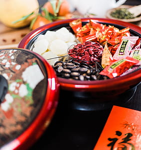 watermelon seeds in black and red bowl thumbnail