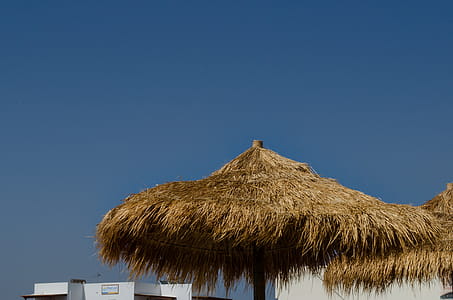 Brown Hut Under Clear Sky thumbnail