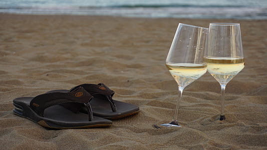 pair of black flip-flops thumbnail