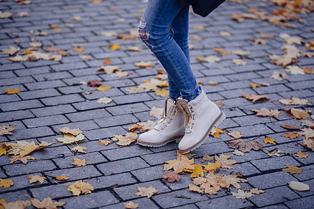 woman wearing brown leather work boots thumbnail